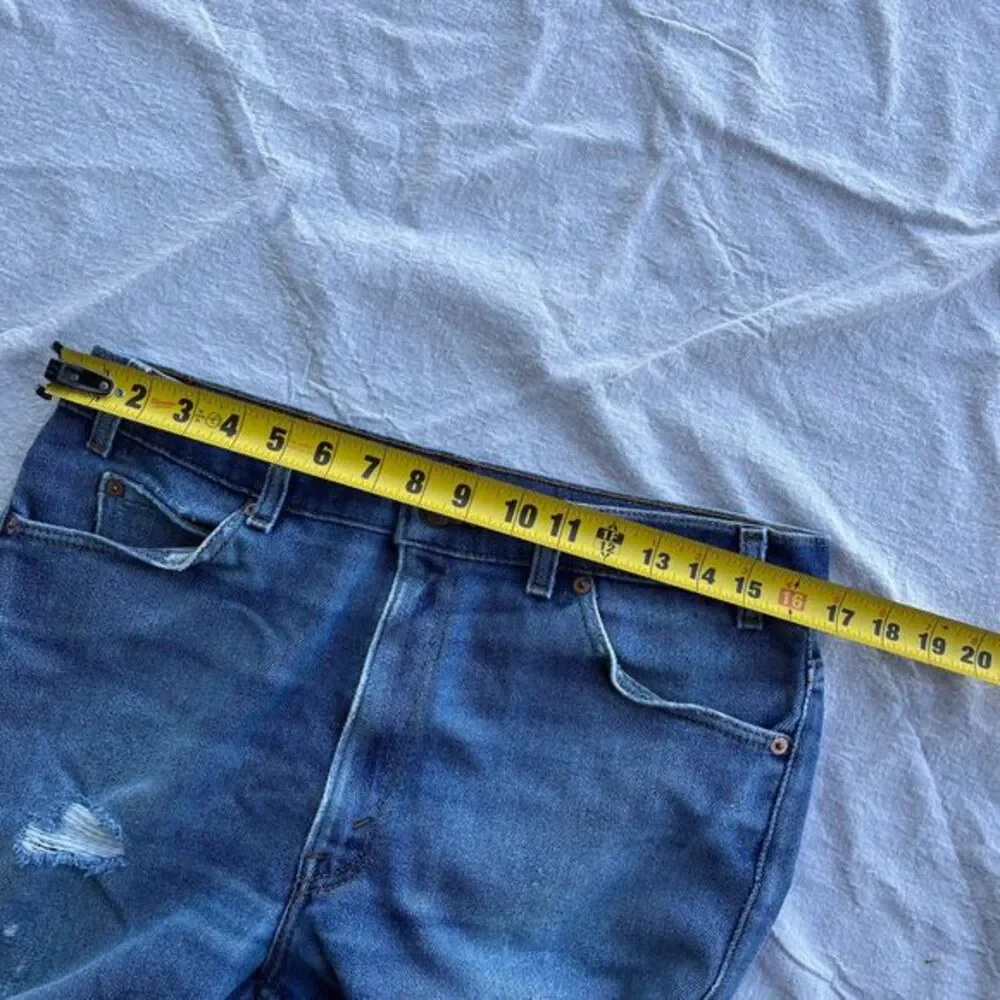 Vintage Distressed orange tab little‎ e Levis pants